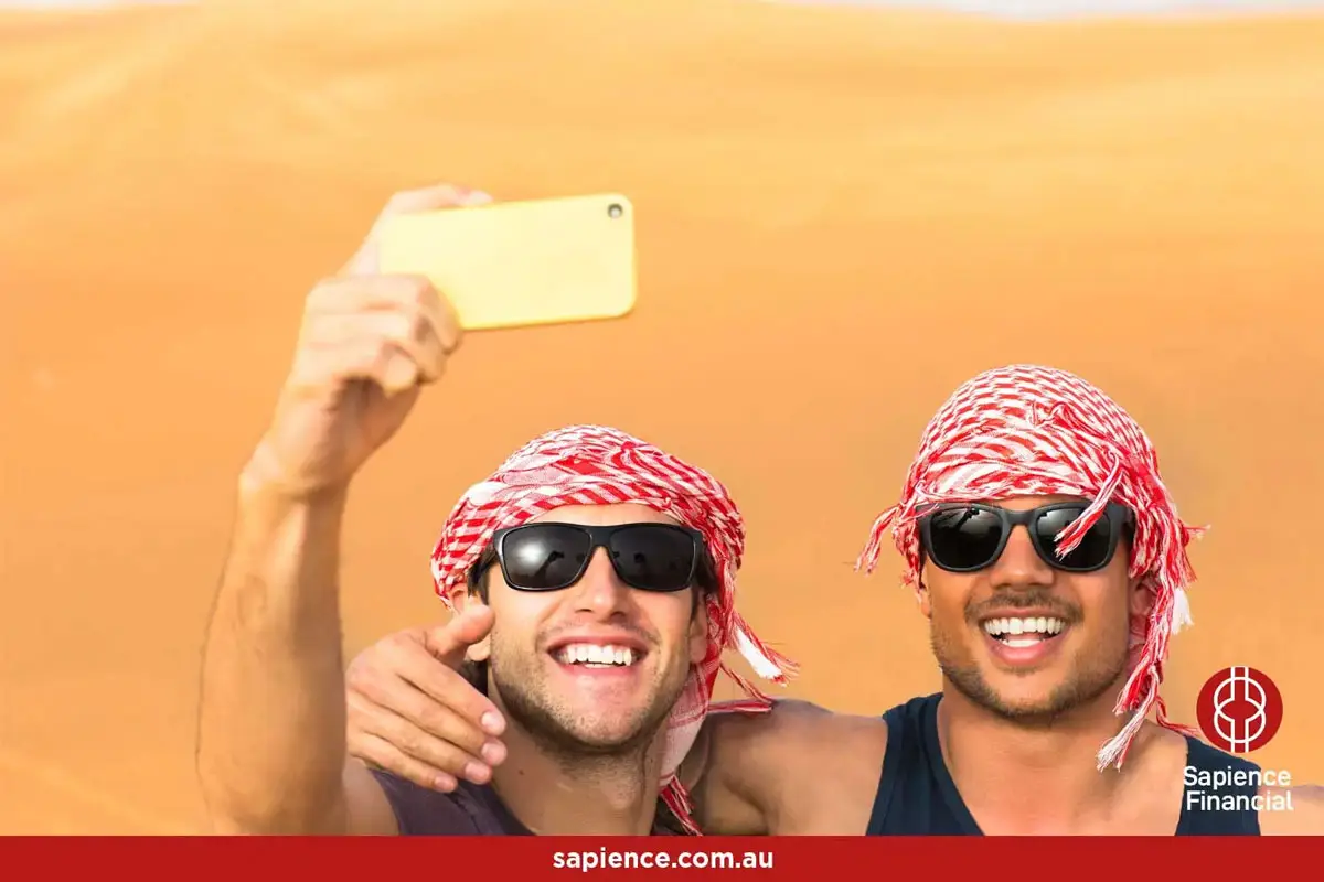 two best friends on holidays together taking a selfie photo