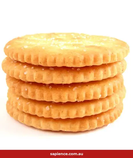 stack of processes salt crackers, high in processes sugar